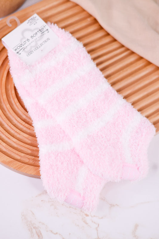 Pink & White Striped Fuzzy Ankle Socks shown on a wooden tray with soft textured fabric and cozy pastel styling