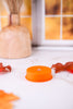 Orange LED Tea Light With Flashing Colorful Lights