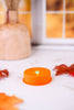 Orange LED Tea Light With Flashing Colorful Lights