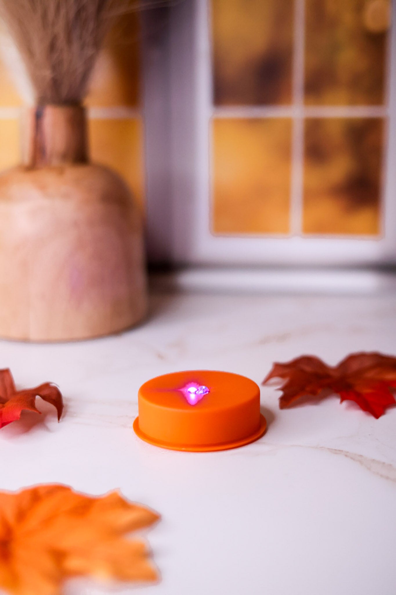 Orange LED Tea Light With Flashing Colorful Lights