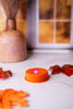 Orange LED Tea Light With Flashing Colorful Lights