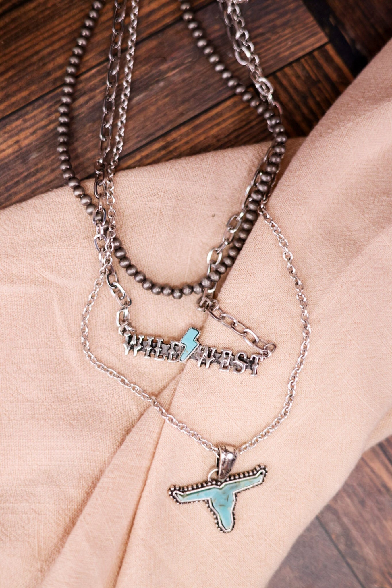 Multi Layered Necklace with Blue Stone Steer