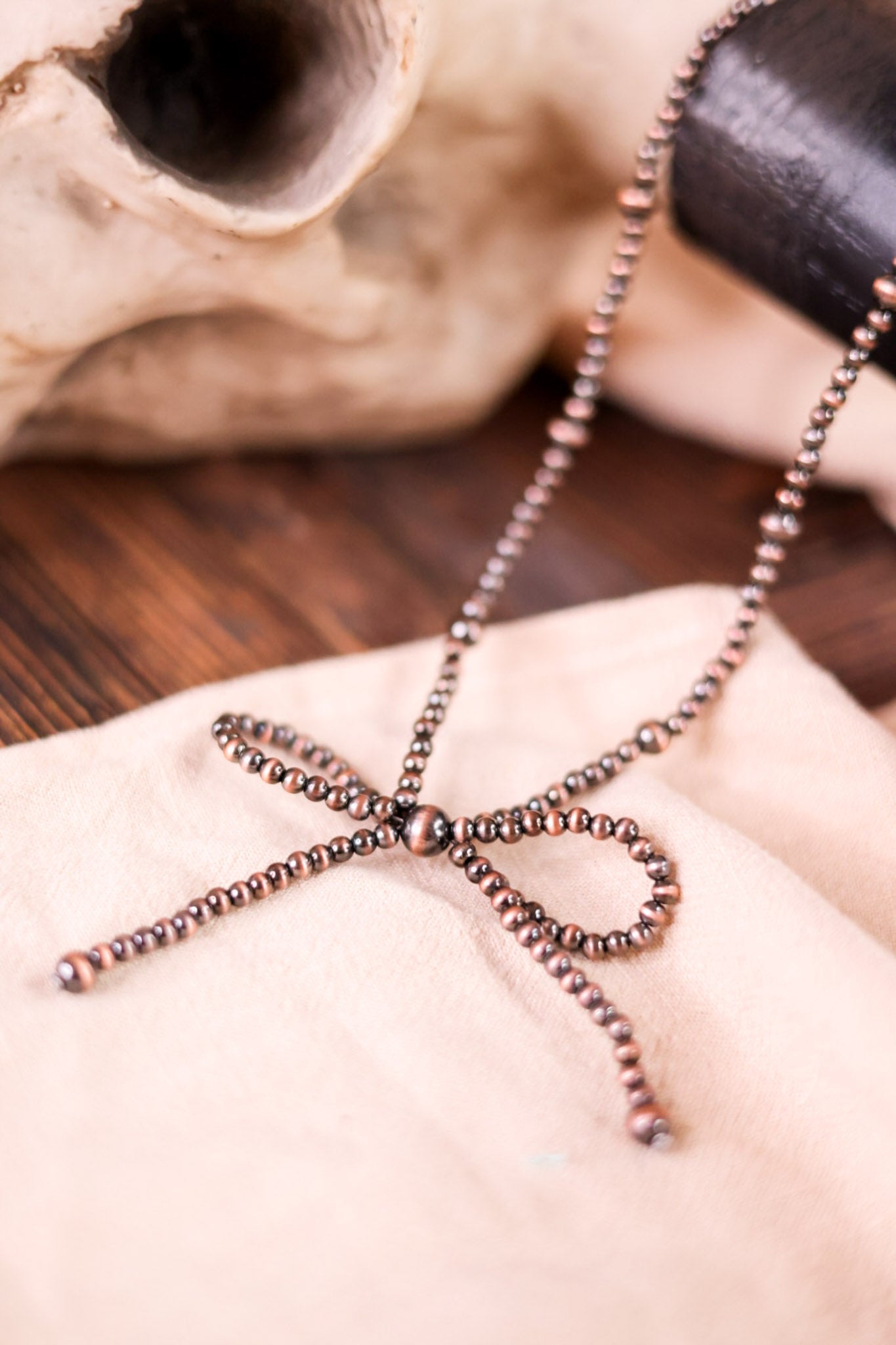 Navajo-Style Copper Pearl Necklace with Coquette Bow