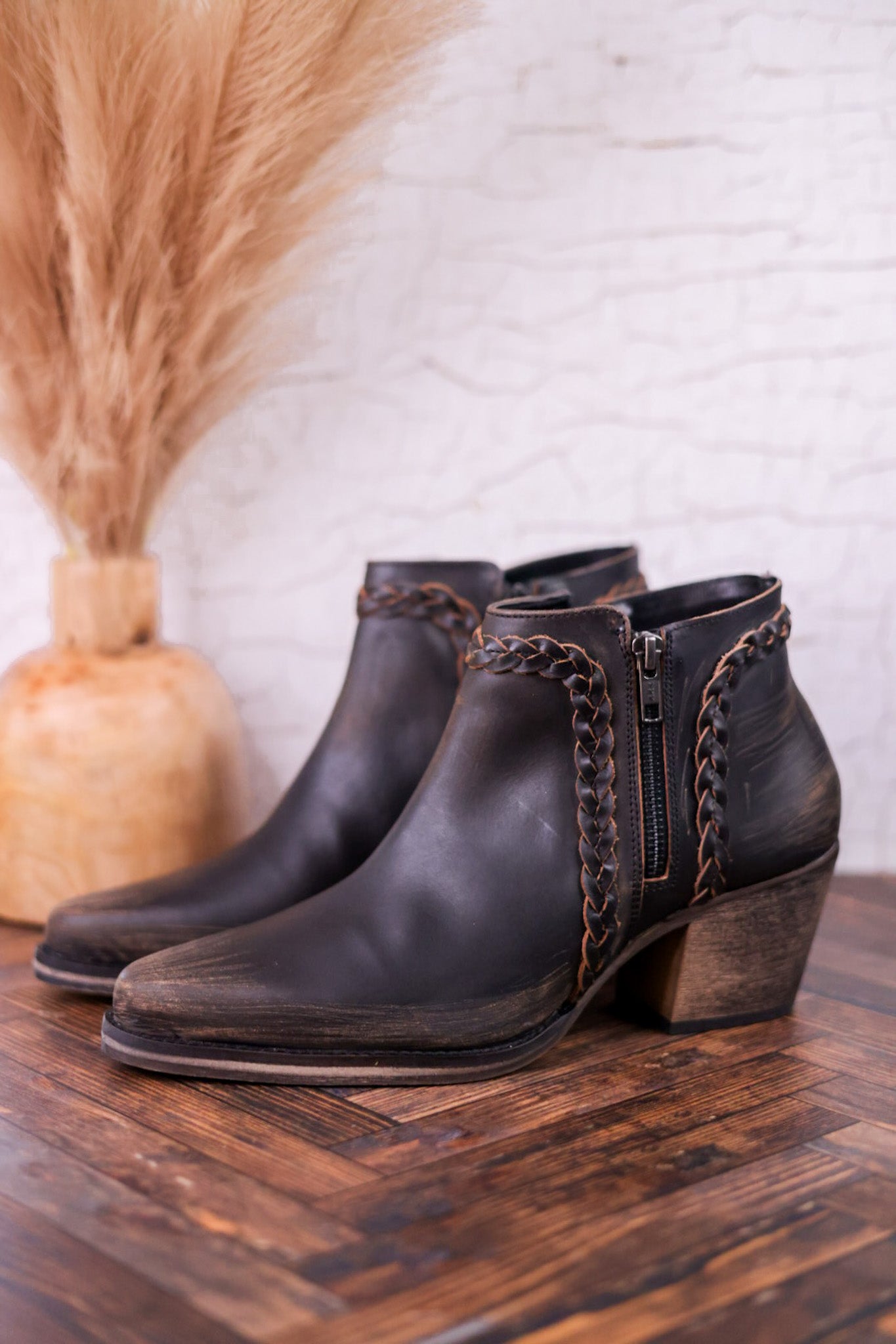 Black Distressed Leather Ankle Booties with Braided Detail