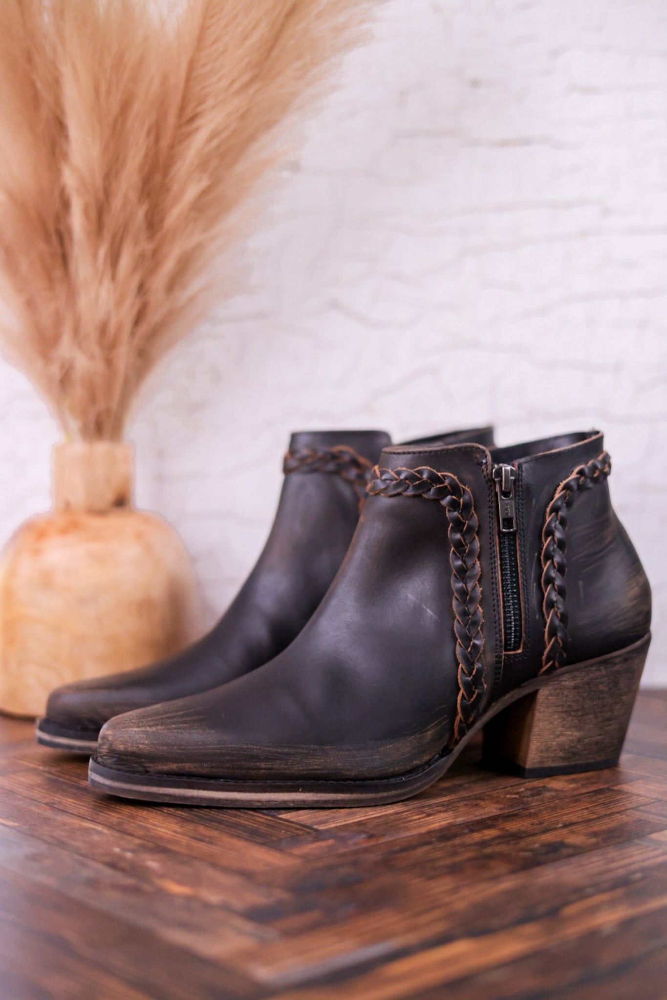 Black Distressed Leather Ankle Booties with Braided Detail