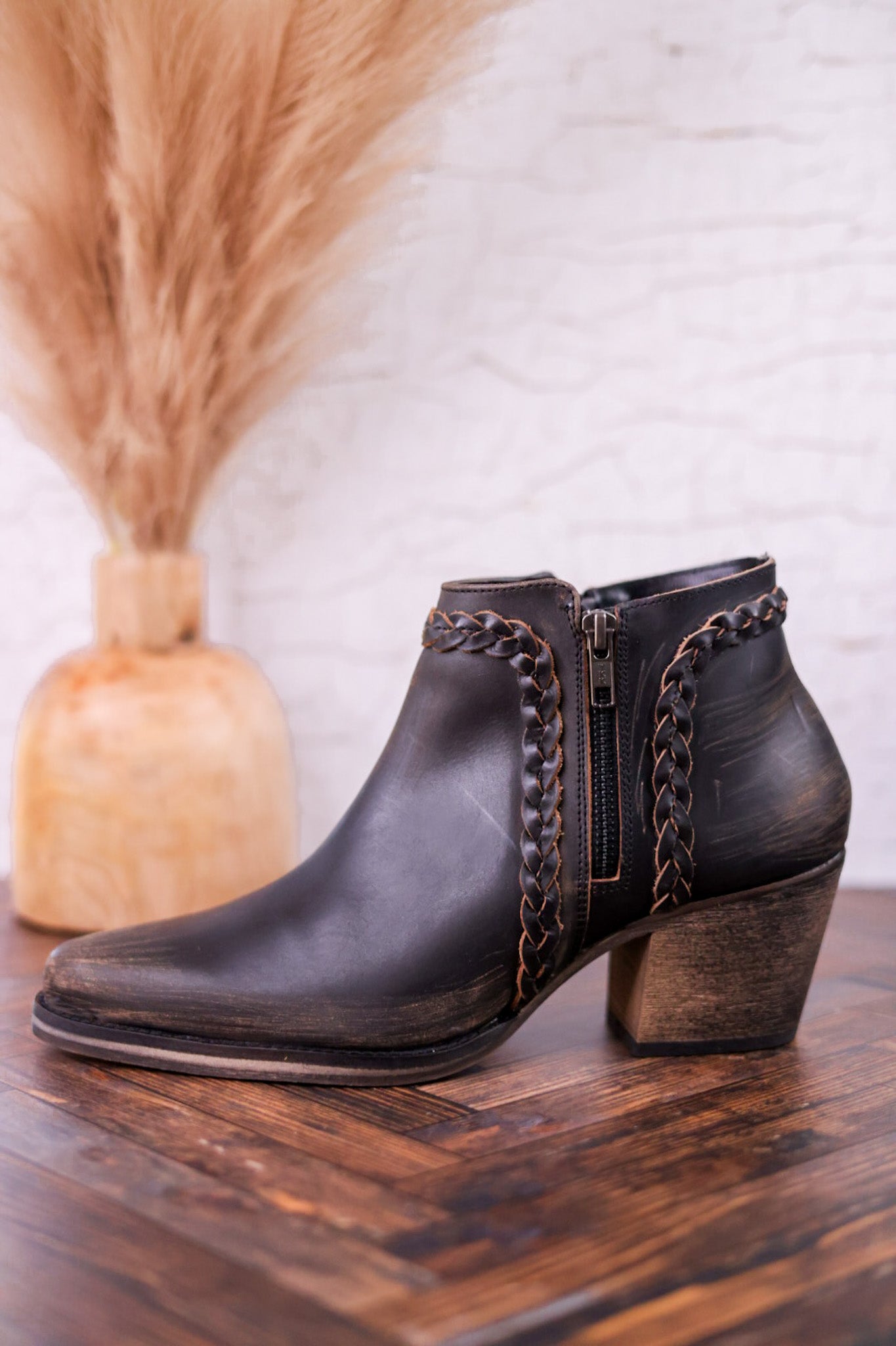 Black Distressed Leather Ankle Booties with Braided Detail