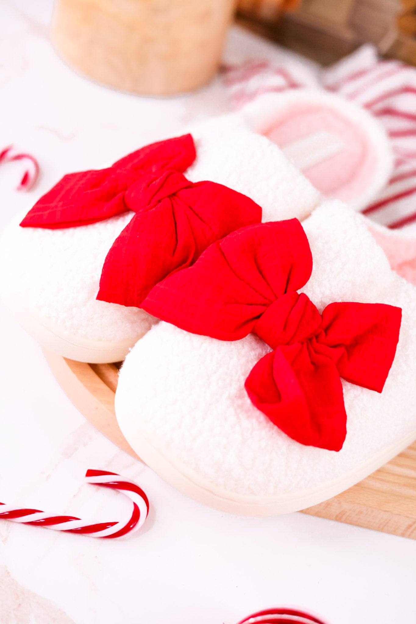 White Fuzzy Slippers With Red Bow
