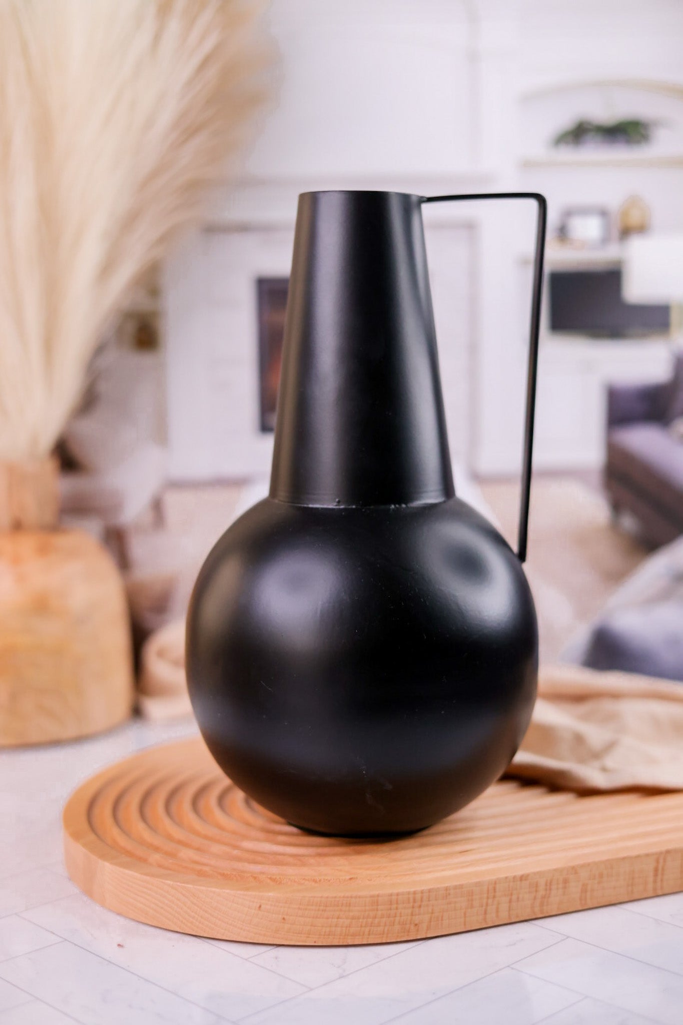 Rounded Black Iron Pitcher