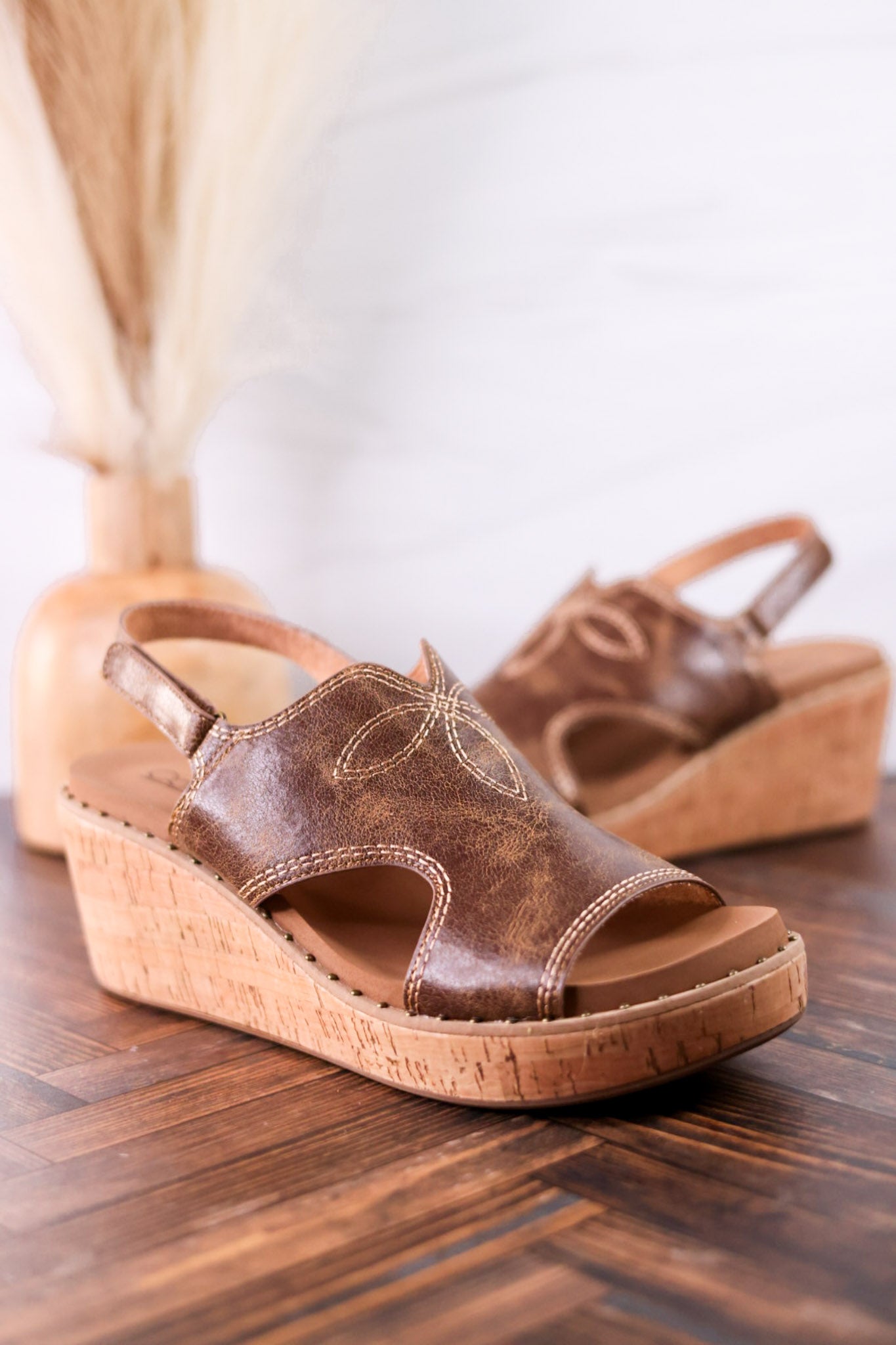 Cognac Faux Leather Wedges With Stitching featuring detailed embroidery on upper and cork platform for comfortable Western fashion style