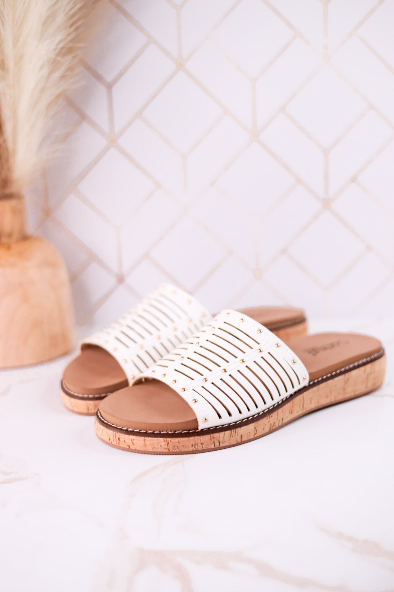 "At Ease" White Slip On Sandals With Stud Accents