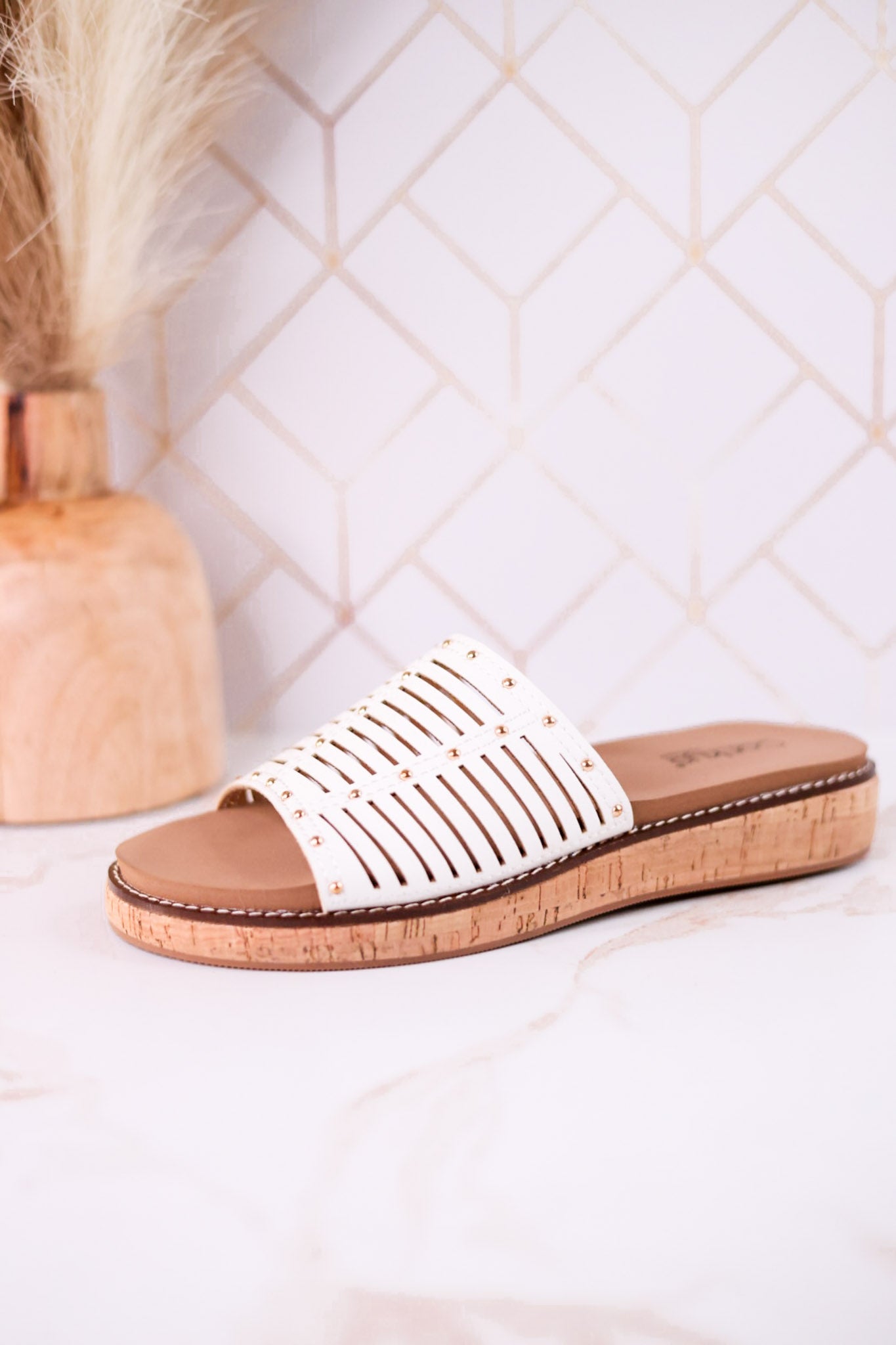 "At Ease" White Slip On Sandals With Stud Accents