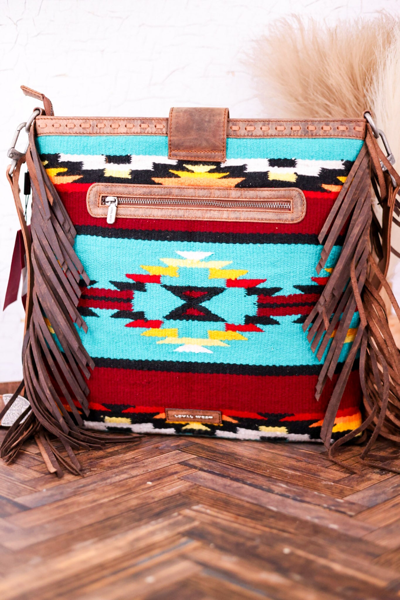 The Long Chap Patterned Canvas Purse with Cowhide Tassels