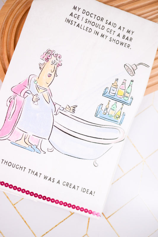 A Bar In The Shower Glittery Kitchen Towel featuring a humorous doctor cartoon and bathtub scene with shower bar joke text