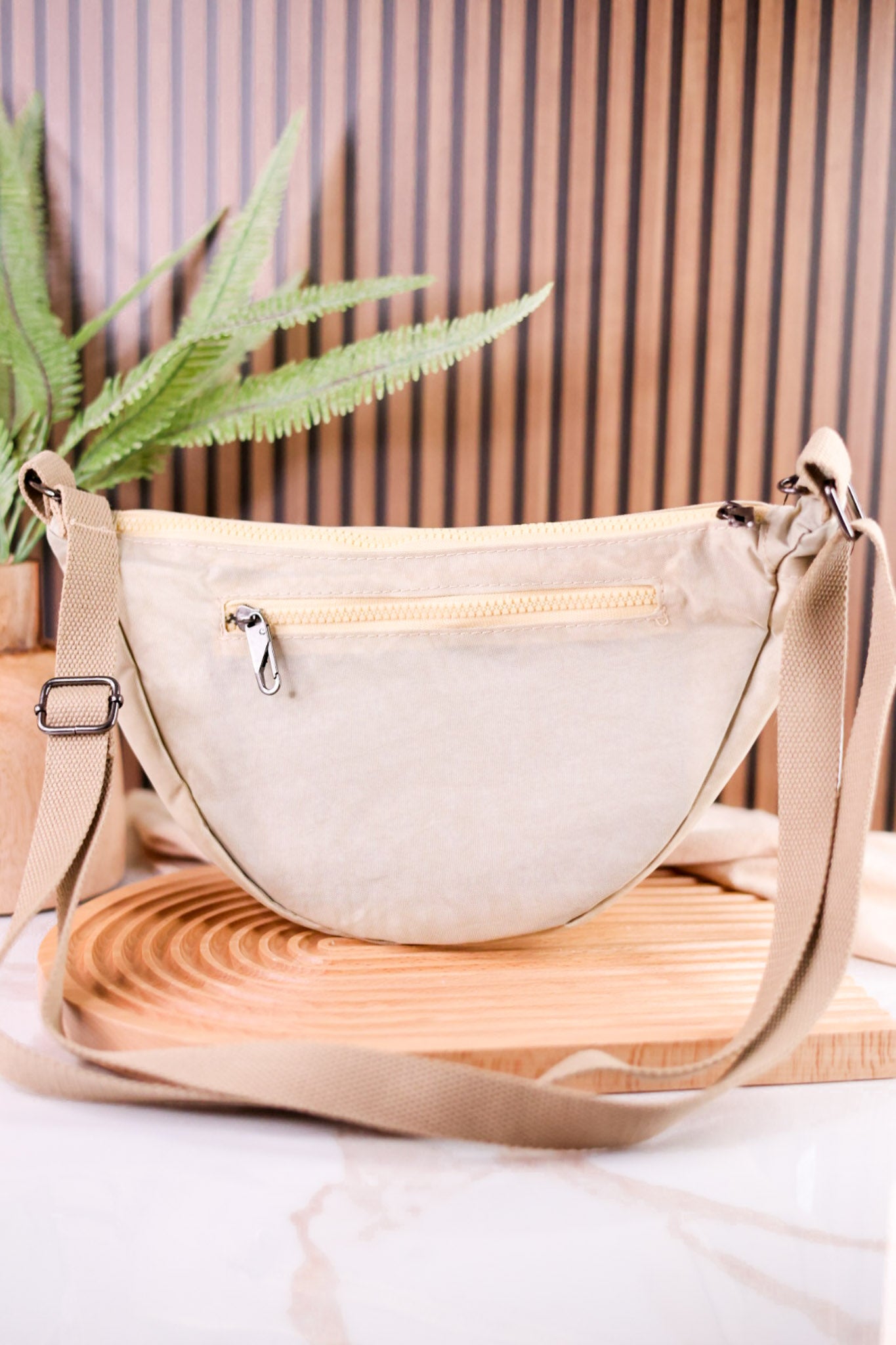 Anti Theft Crescent Sling Bag in Beige