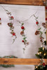 5ft Snowy Pine and Bells Garland - Whiskey Skies - MELROSE INTL