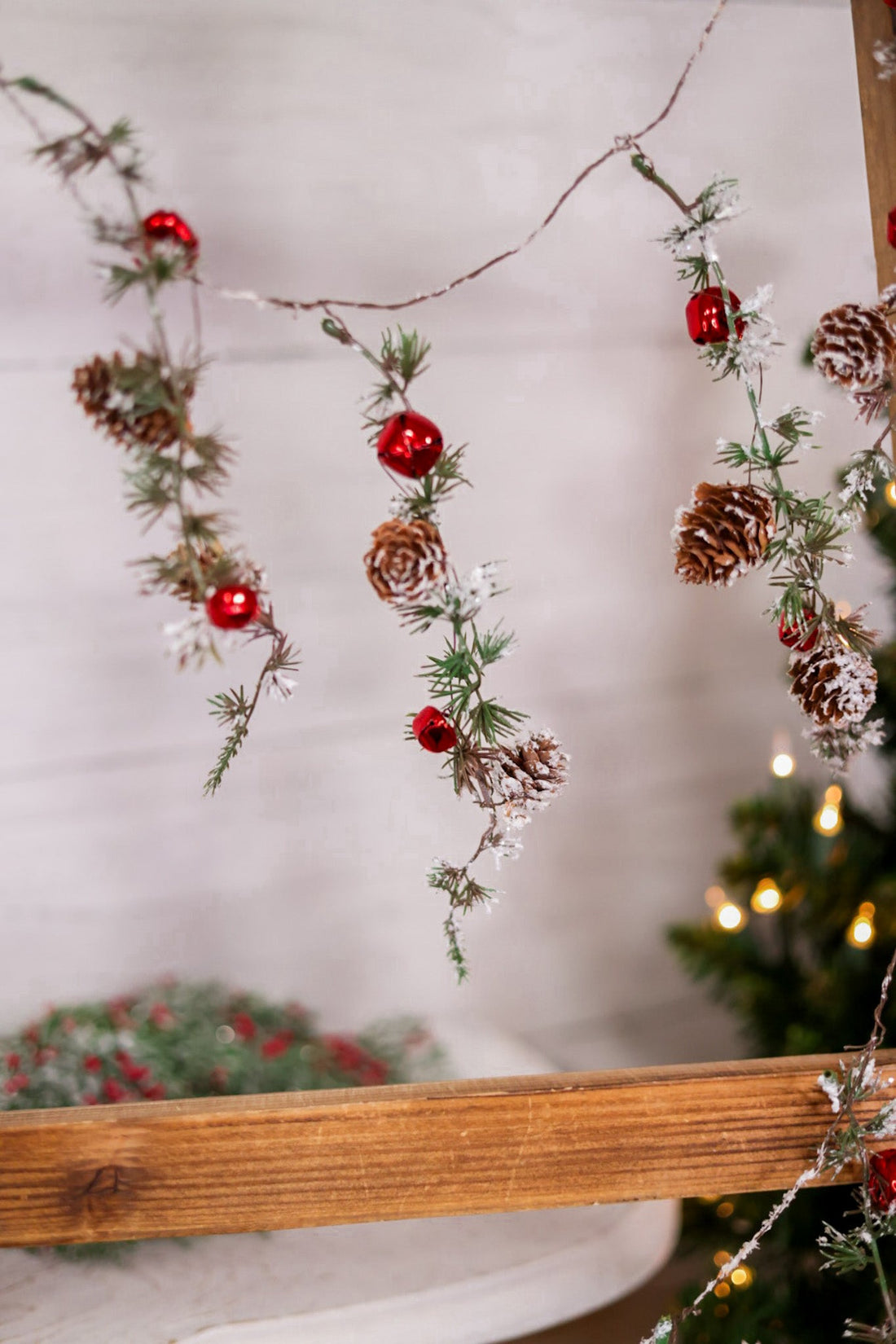 5ft Snowy Pine and Bells Garland - Whiskey Skies - MELROSE INTL