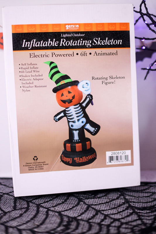 6' Inflatable Electric Lighted Rotating Skeleton - Whiskey Skies - GERSON COMPANIES
