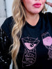 Long Sequin Sleeve Black Top W/ Poison Glasses Detail