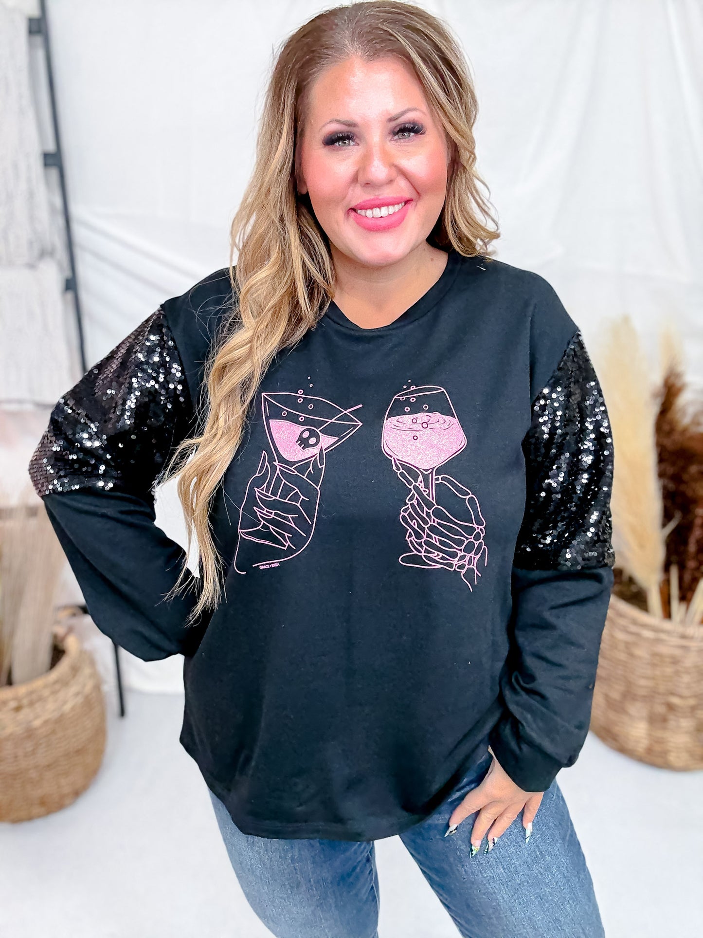 Long Sequin Sleeve Black Top W/ Poison Glasses Detail