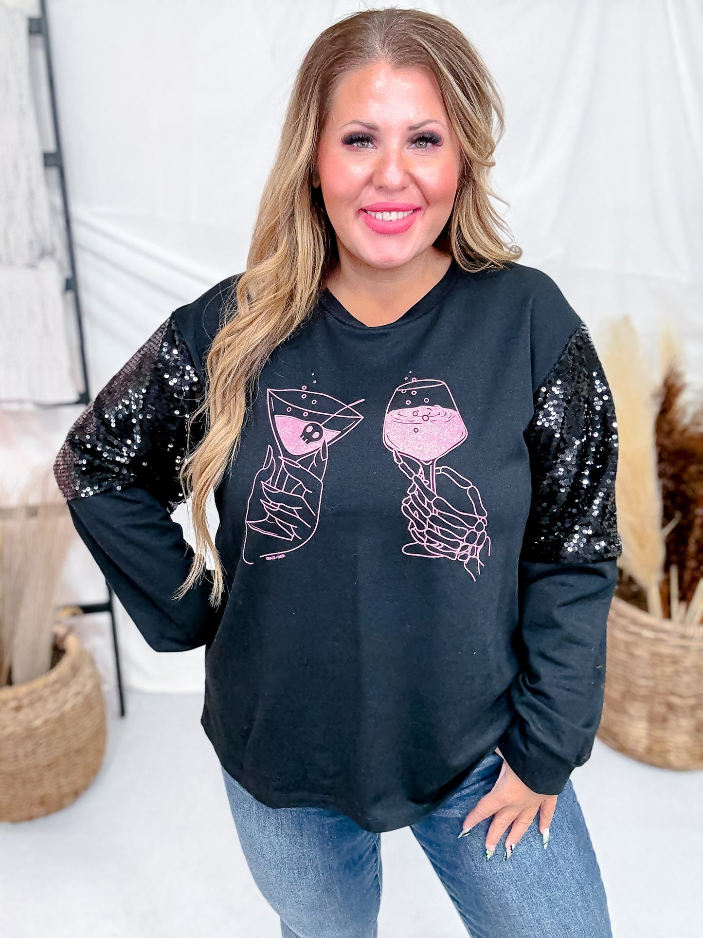Long Sequin Sleeve Black Top W/ Poison Glasses Detail