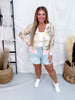 Woman wearing Vintage Floral Print Sheer Long Sleeve Button Front Cardigan with pastel floral pattern and pink trim