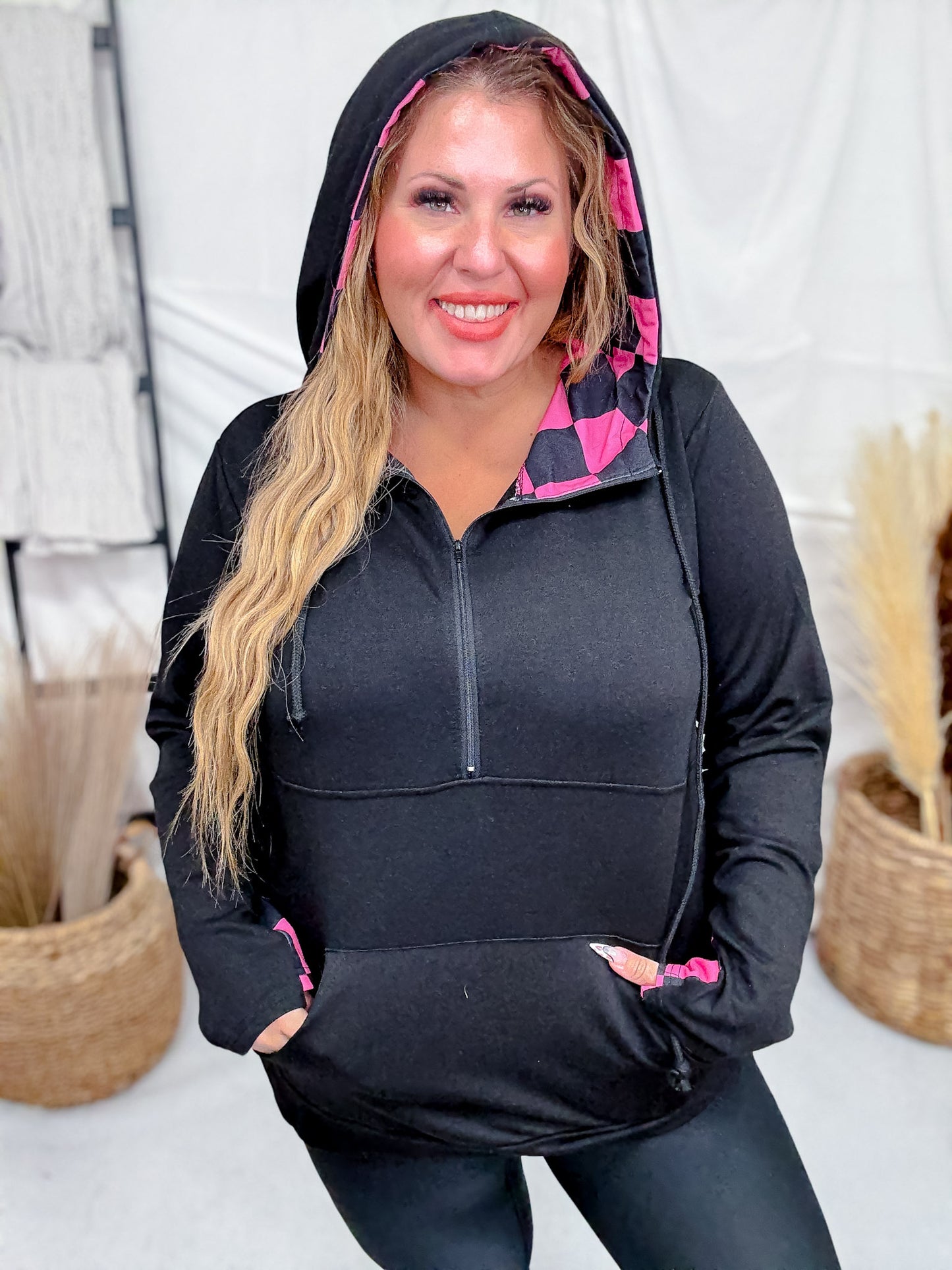 Black Hoodie With Half Zip and Pink Checkerboard Accents