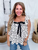 Ruffled Polka Dot Top With Bow Accent