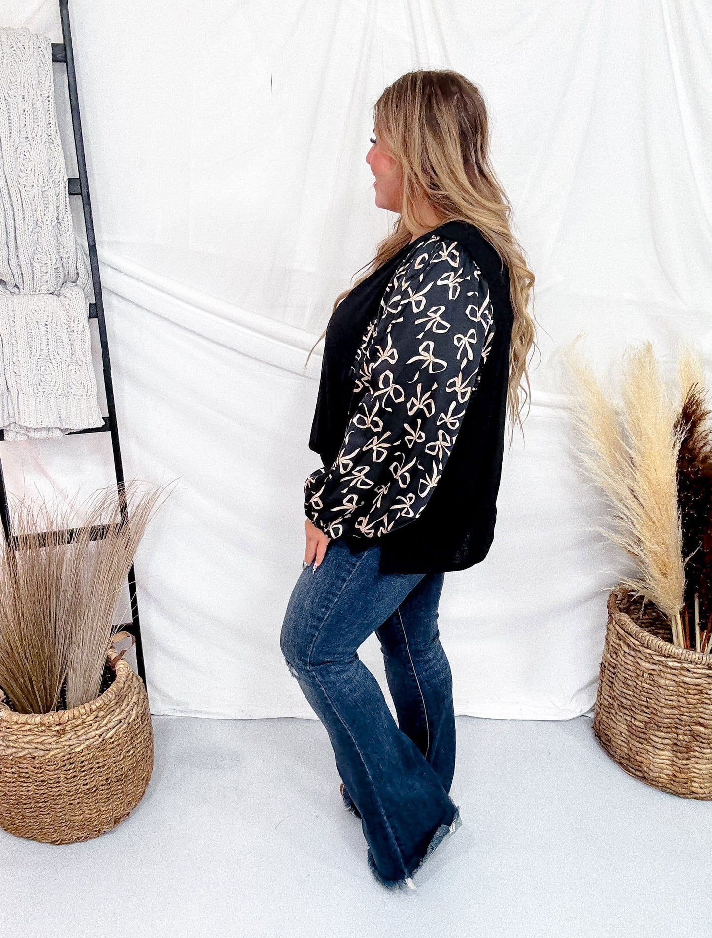 Black Knit Pullover Top With Bow Print Puff Sleeves