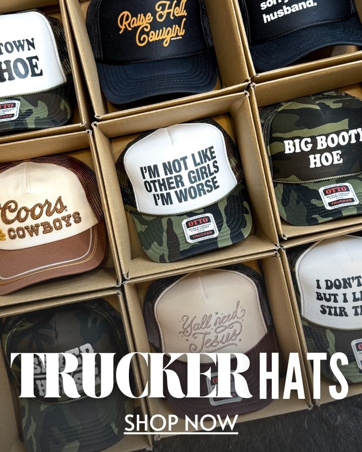 Women’s boutique trucker hats with mesh back and bold patch design – perfect for casual and outdoor style