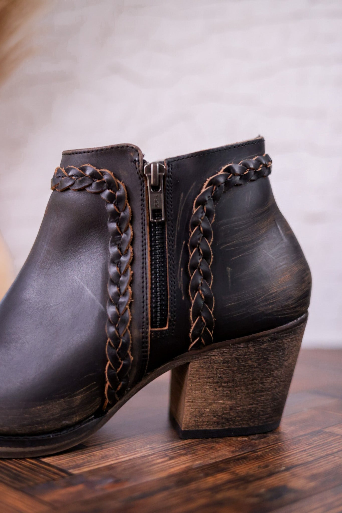 Black Distressed Leather Ankle Booties with Braided Detail - Whiskey Skies - VOLATILE