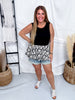 Black Sleeveless Peplum Top With Floral Jaquard Bubble Hem - Whiskey Skies - BIBI