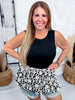 Black Sleeveless Peplum Top With Floral Jaquard Bubble Hem - Whiskey Skies - BIBI