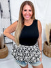Black Sleeveless Peplum Top With Floral Jaquard Bubble Hem - Whiskey Skies - BIBI