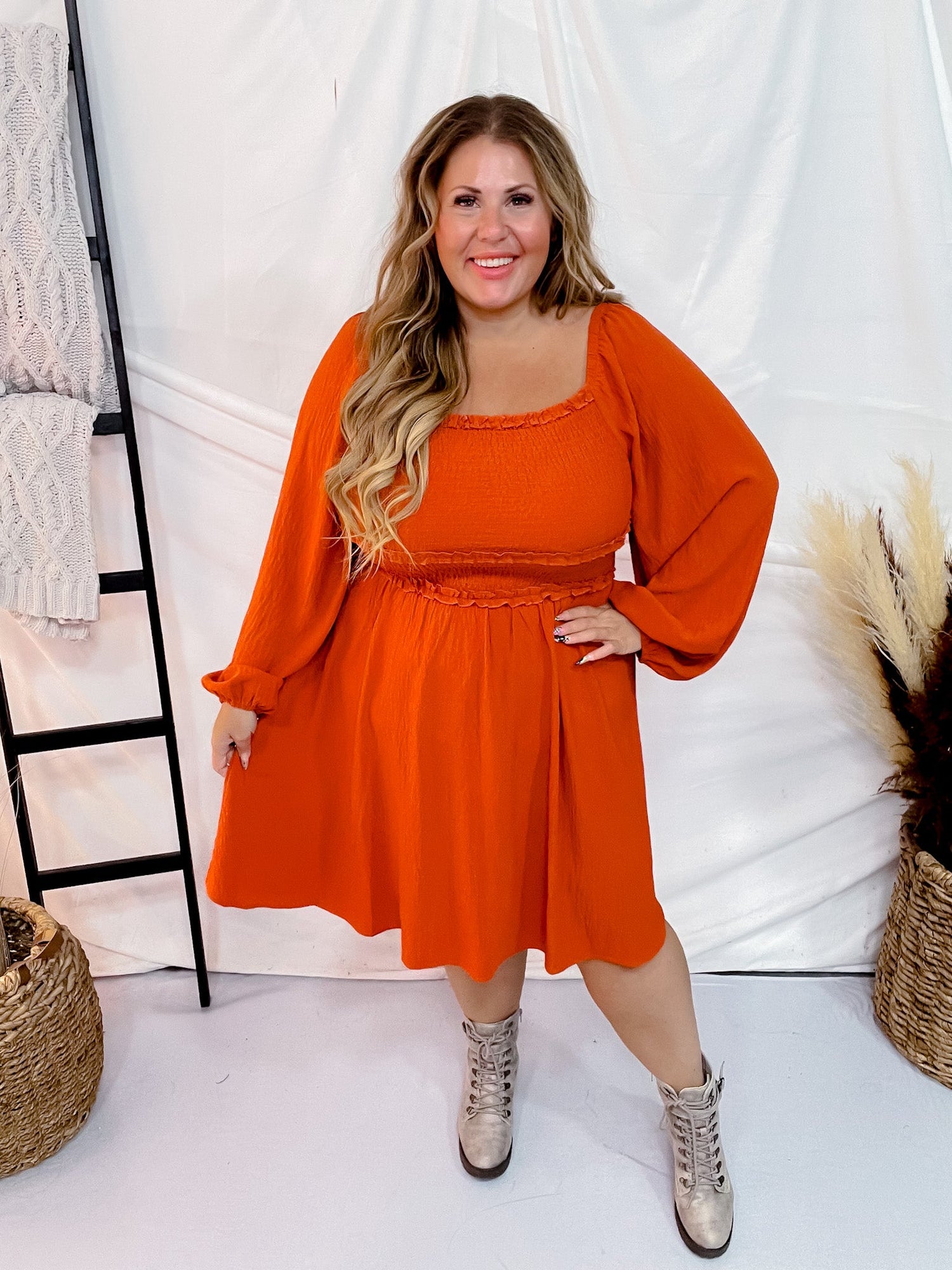 burnt orange long sleeve dress Woven Smocked neckline Long blouson sleeves Smocked waist Mini Material Long Sleeve Burnt Orange Minidress