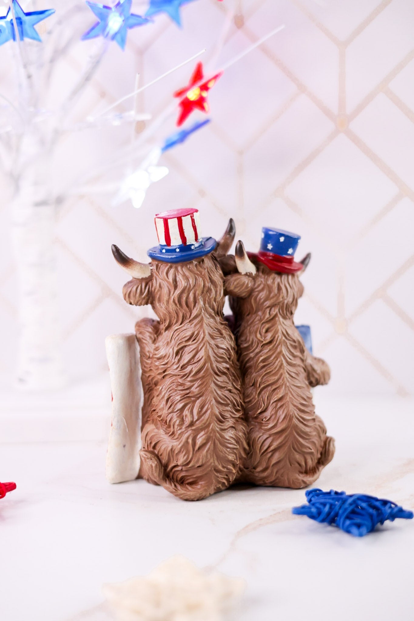 Resin Highland Cows Holding USA Flag - Whiskey Skies - GERSON COMPANIES