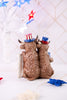 Resin Highland Cows Holding USA Flag - Whiskey Skies - GERSON COMPANIES