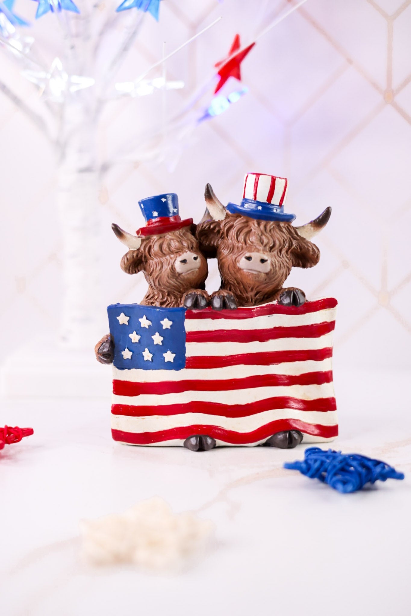 Resin Highland Cows Holding USA Flag - Whiskey Skies - GERSON COMPANIES