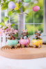 Resin Highland Cows In Easter Egg Carts (3 Styles) - Whiskey Skies - GERSON COMPANIES