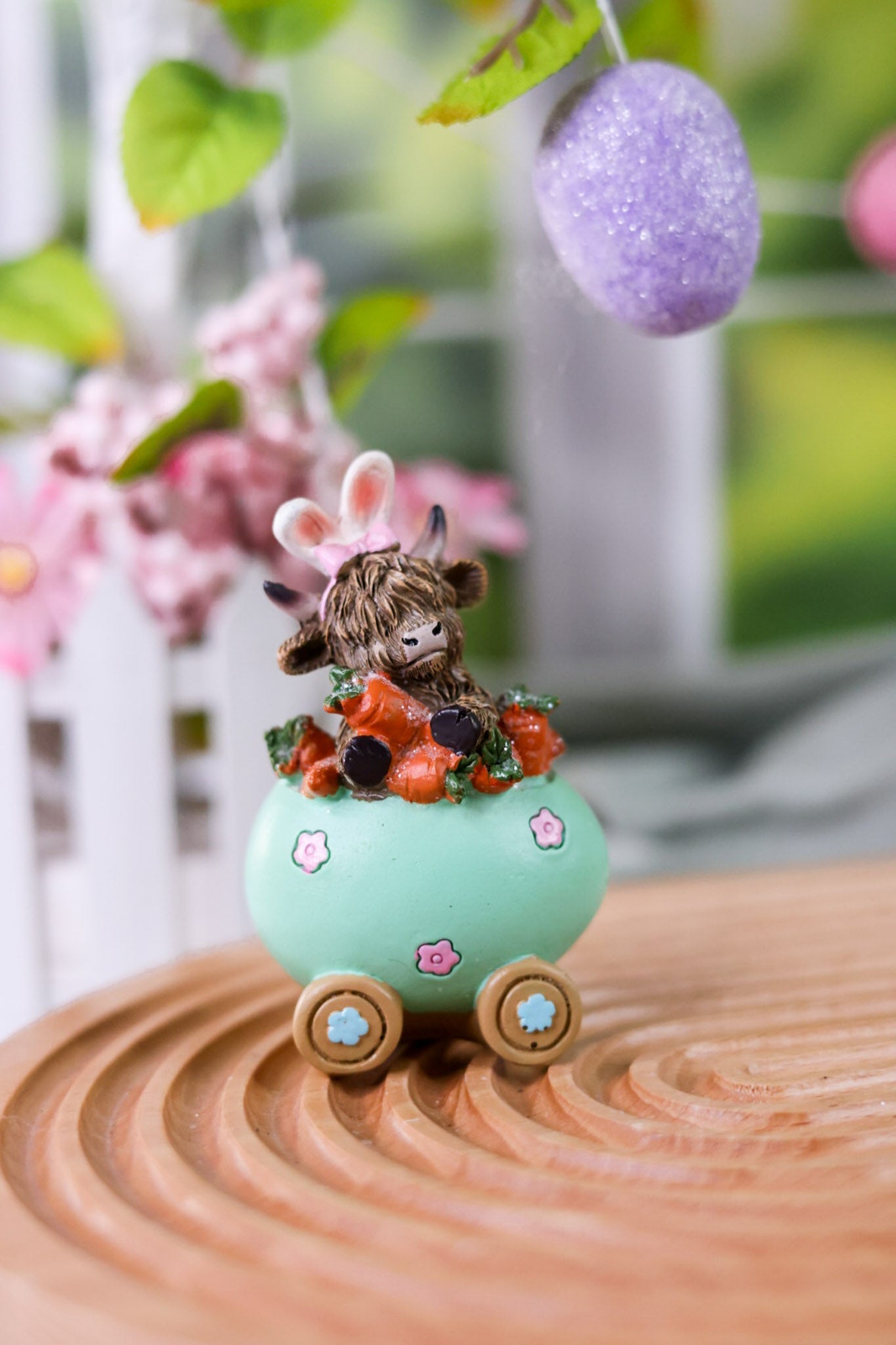 Resin Highland Cows In Easter Egg Carts (3 Styles) - Whiskey Skies - GERSON COMPANIES