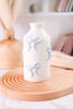 White Ceramic Bud Vase With Blue Bow Pattern - Whiskey Skies - MUD PIE