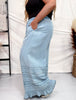 Wide Leg Chambray Pants With Ruffle Hem In Light Denim - Whiskey Skies - EASEL