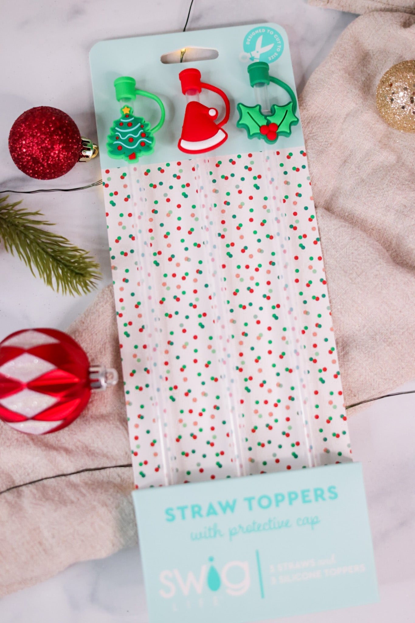 https://whiskeyskies.com/cdn/shop/products/reusable-straws-with-christmas-tree-toppers-set-of-3-452865_1445x.jpg?v=1700909643