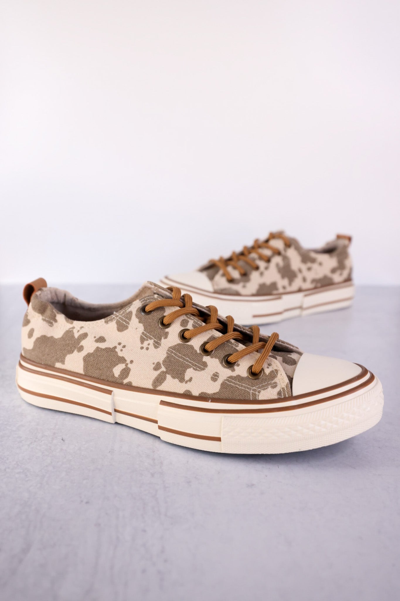 Cow on sale print sneakers